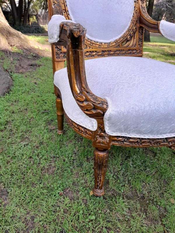 A 20th Century French Louis XVI Style Five Piece Set of Giltwood Settee and Four Armchairs