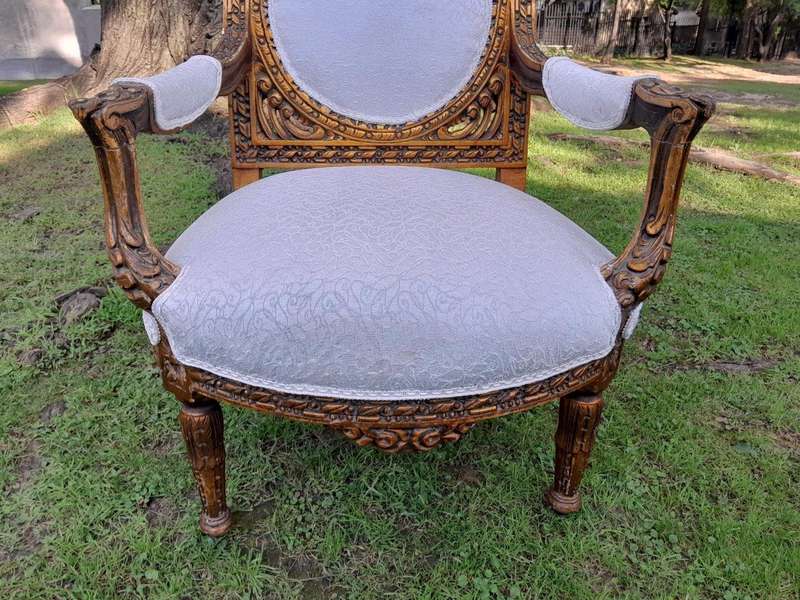 A 20th Century French Louis XVI Style Five Piece Set of Giltwood Settee and Four Armchairs