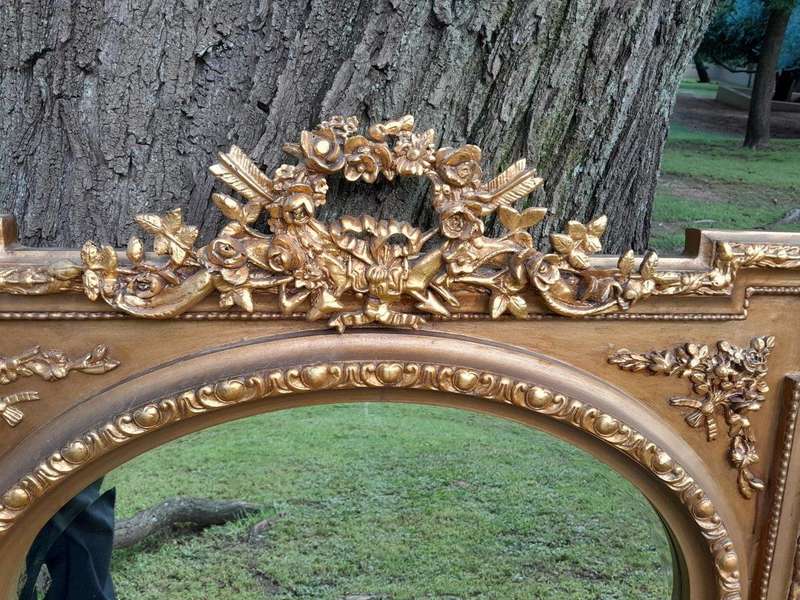 A French Rococo Style Ornately Carved and Gilded Bevelled Mirror 2