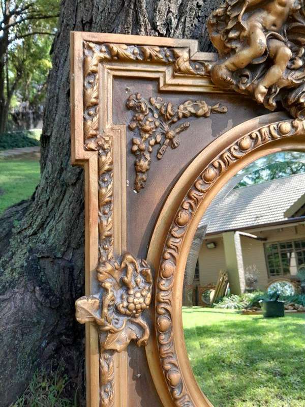 A French Rococo Style Ornately Carved and Gilded Bevelled Mirror 3