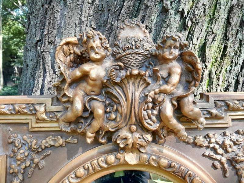 A French Rococo Style Ornately Carved and Gilded Bevelled Mirror 3