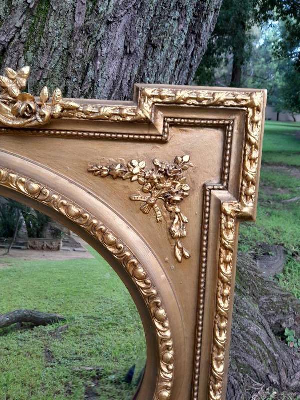 A French Rococo Style Ornately Carved and Gilded Bevelled Mirror 4