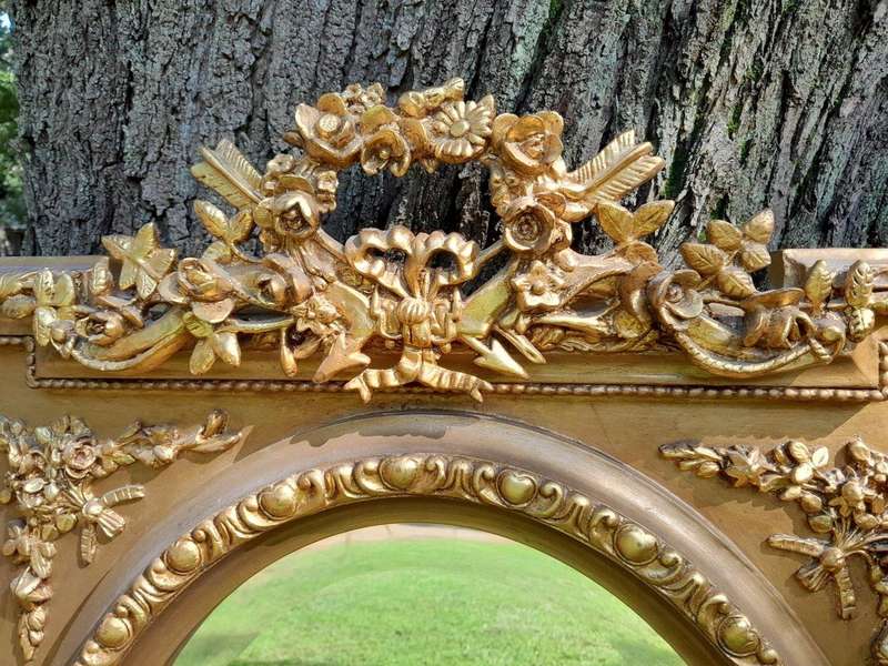 A French Rococo Style Ornately Carved and Gilded Bevelled Mirror 5