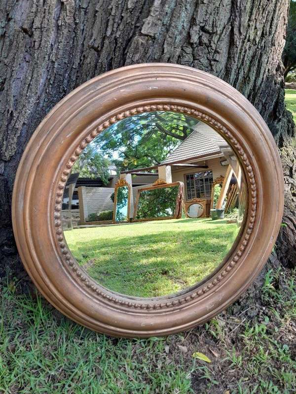A French Style Circular Wooden Bevelled Mirror