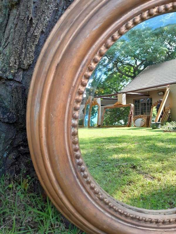 A French Style Circular Wooden Bevelled Mirror