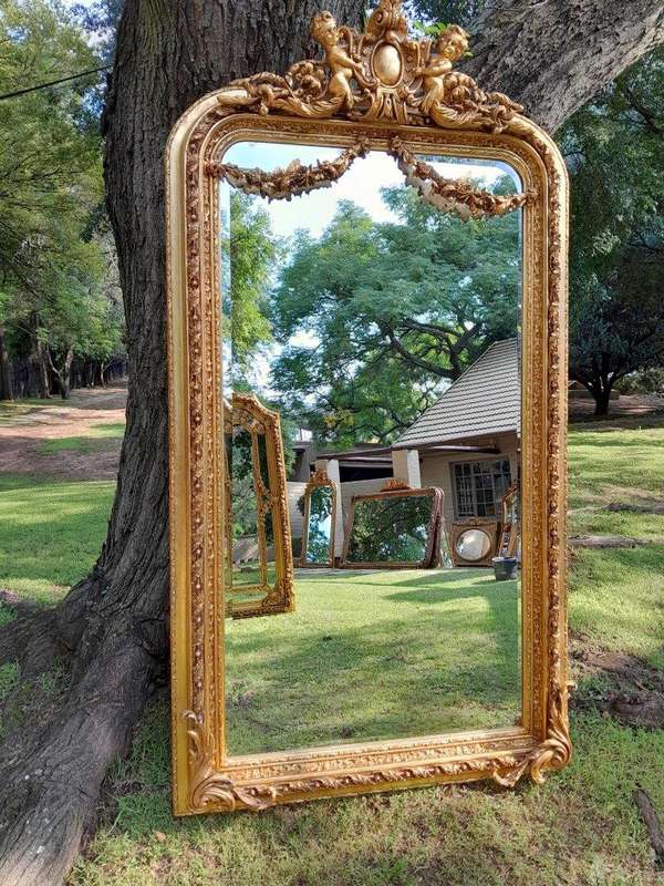 A French Style Ornately Carved and Gilded Bevelled Mirror 3