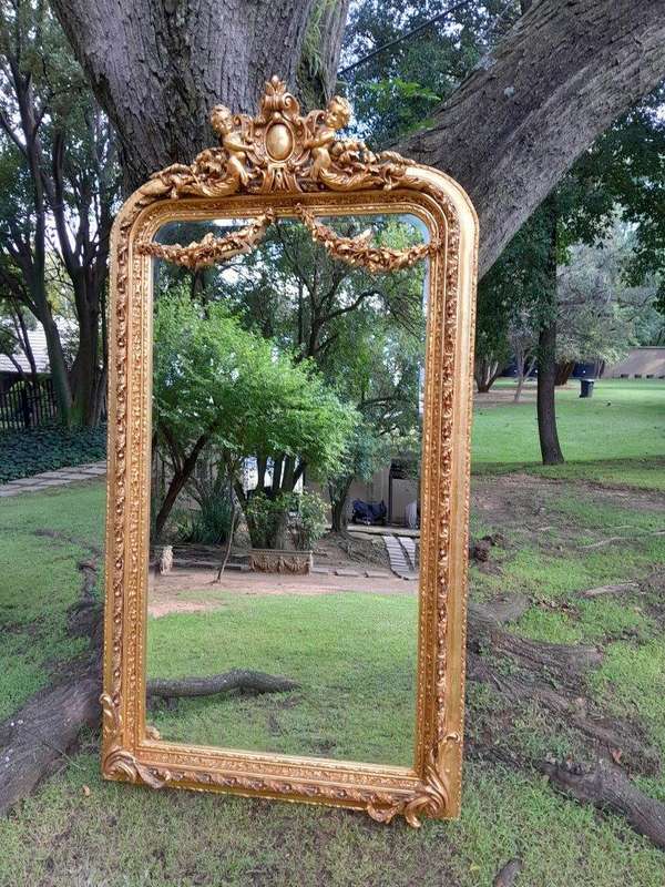 A French Style Ornately Carved and Gilded Bevelled Mirror 3