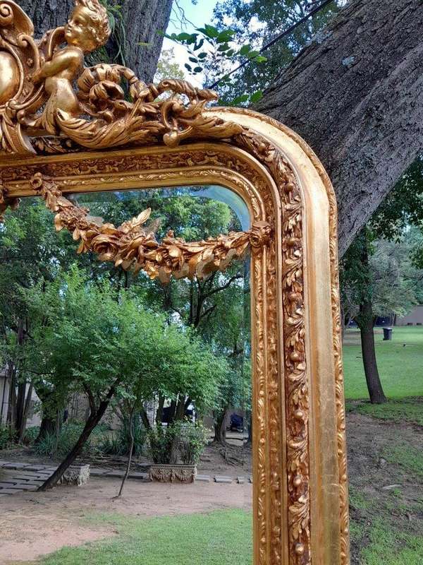 A French Style Ornately Carved and Gilded Bevelled Mirror 3