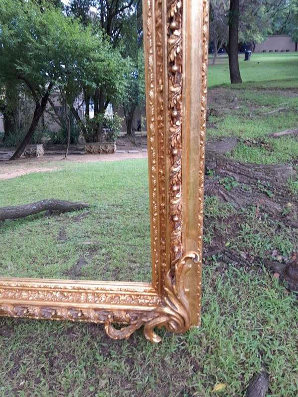 A French Style Ornately Carved and Gilded Bevelled Mirror 3