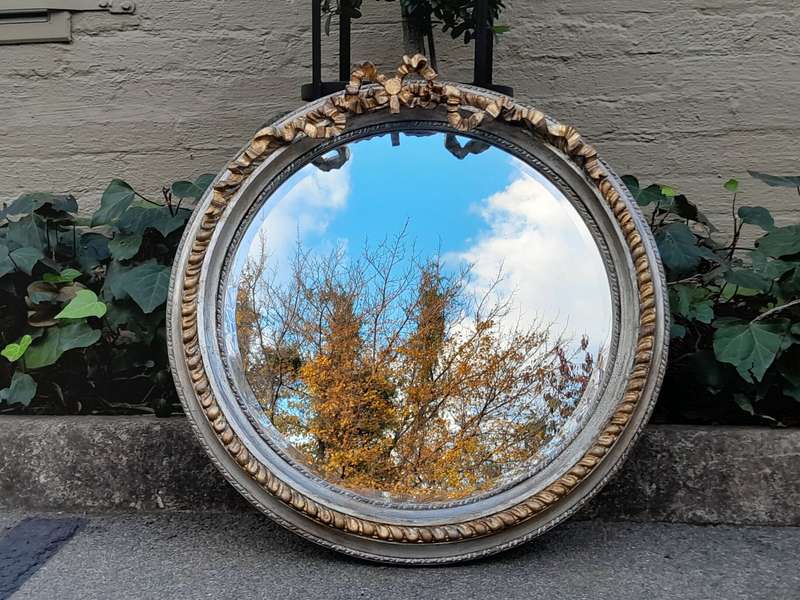 A French Style Carved and Gilded Bevelled Mirror
