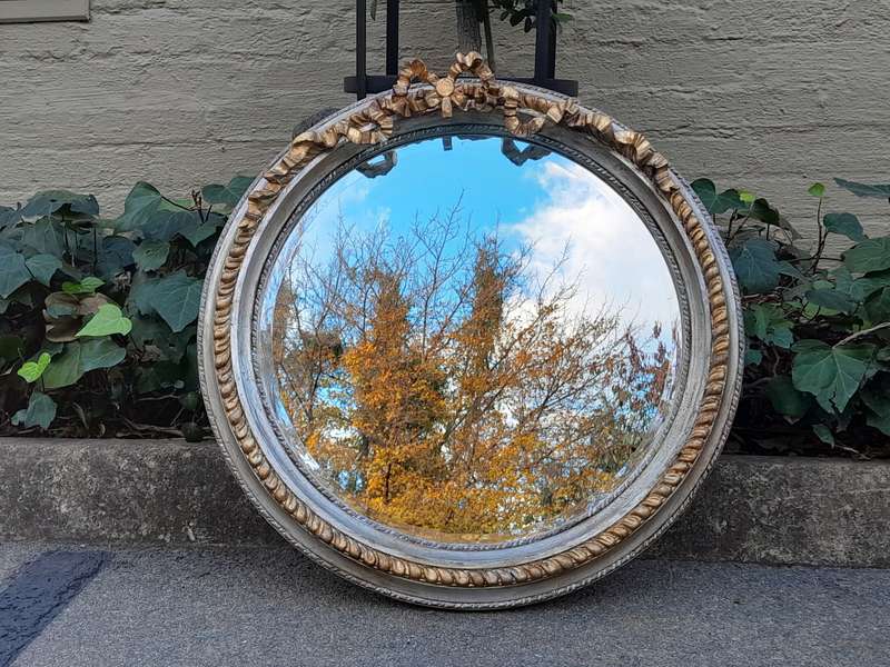 A French Style Carved and Gilded Bevelled Mirror