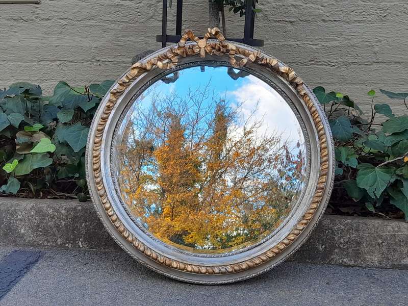 A French Style Carved and Gilded Bevelled Mirror
