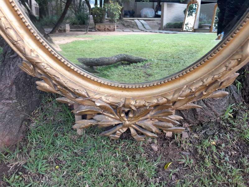 A French Style Ornately Carved and Gilded Bevelled Mirror 8