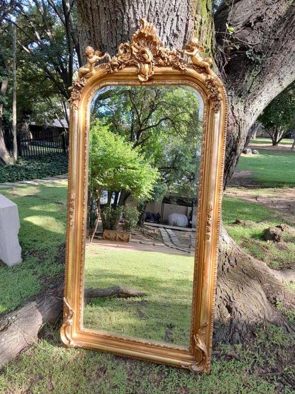 A French Style Ornately Carved and Gilded Bevelled Mirror 12