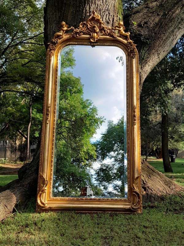 A French Style Ornately Carved and Gilded Bevelled Mirror 12