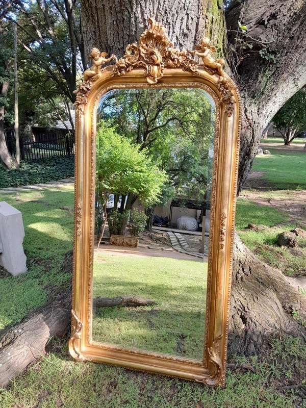 A French Style Ornately Carved and Gilded Bevelled Mirror 12