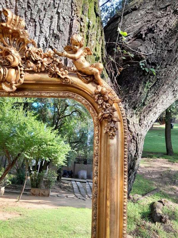 A French Style Ornately Carved and Gilded Bevelled Mirror 12