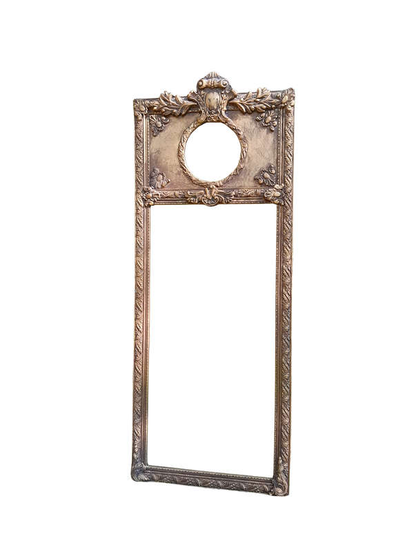 An Ornate Carved Bevelled French Style Mirror
