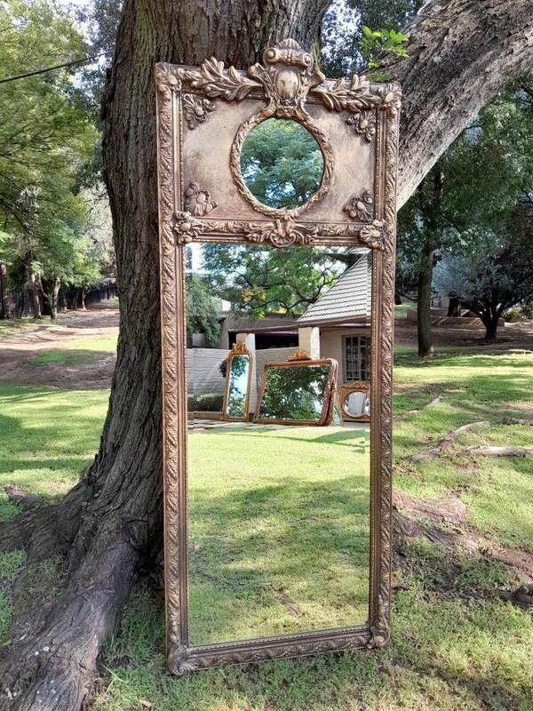 An Ornate Carved Bevelled French Style Mirror