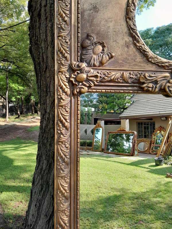 An Ornate Carved Bevelled French Style Mirror