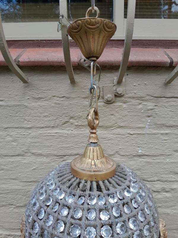 A 20th Century Brass Gilt Monumental Empire French Style Chandelier with Crystals