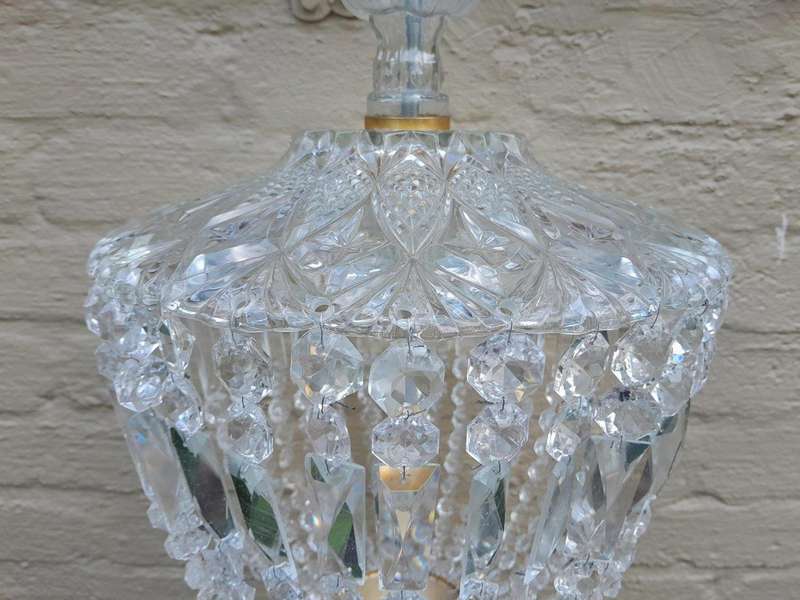 A French Style Brass and Crystal Plate Chandelier