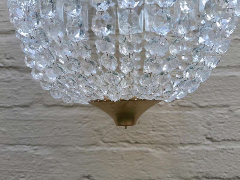 A French Style Brass and Crystal Plate Chandelier