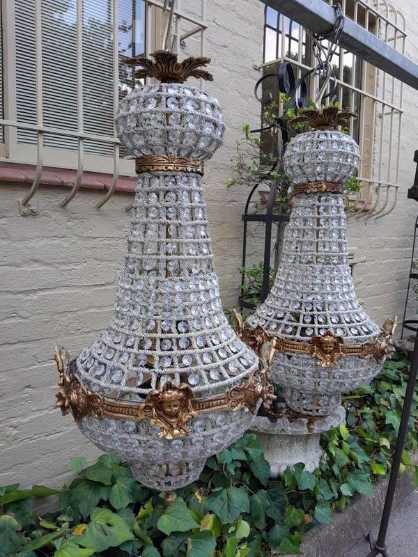 A French Style Pair of Brass Gilt Monumental Empire Chandeliers