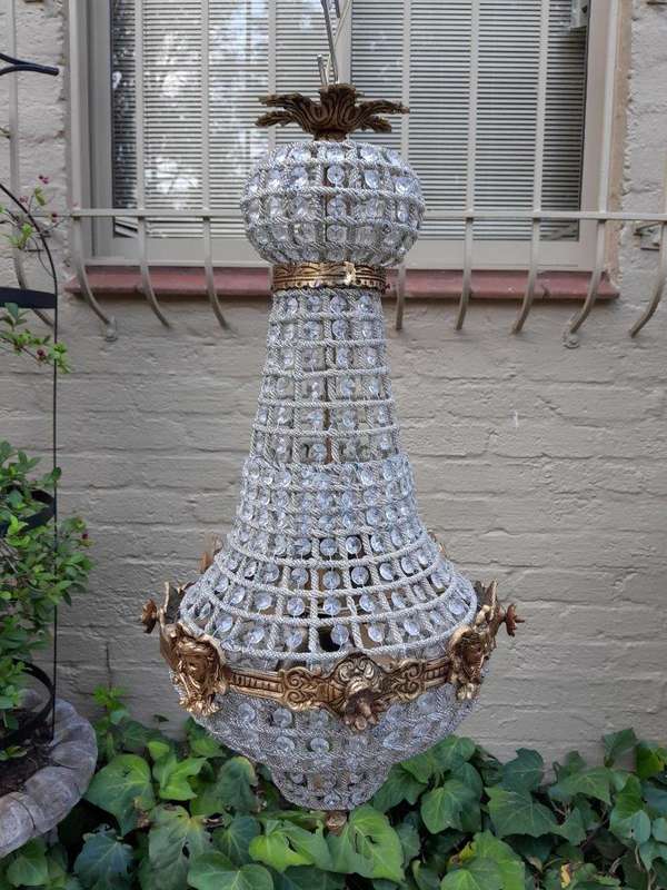 A French Style Pair of Brass Gilt Monumental Empire Chandeliers