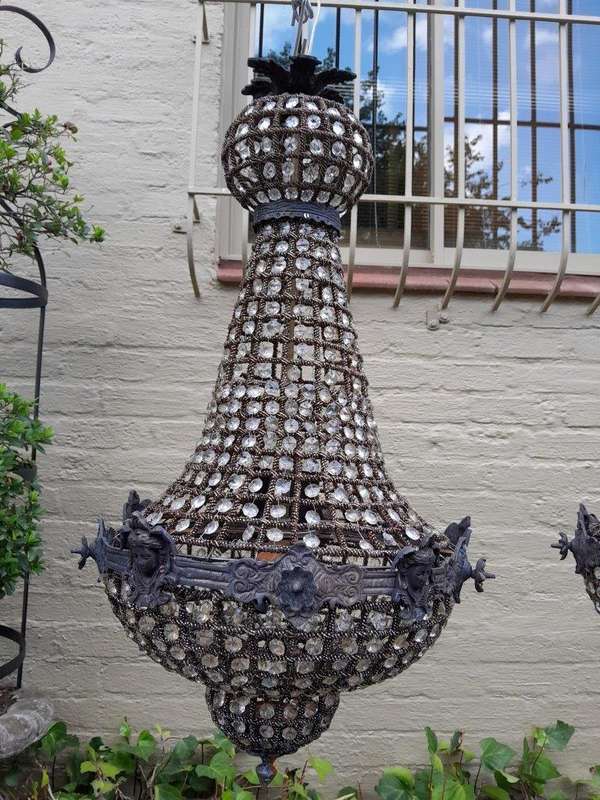 A French Style Pair of Gilt Aged Monumental Empire Chandeliers