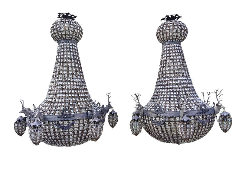 A Large Aged Pair of Monumental Empire French Style Chandeliers with Deer Head Figures