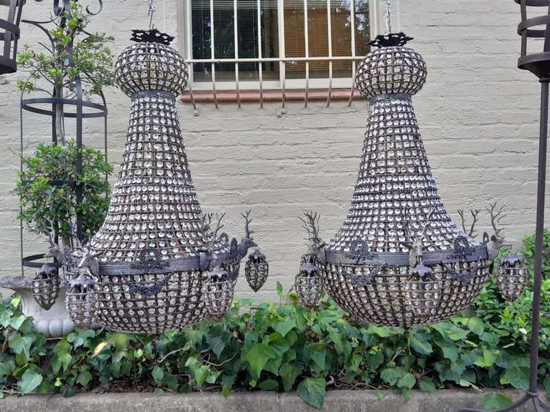 A Large Aged Pair of Monumental Empire French Style Chandeliers with Deer Head Figures