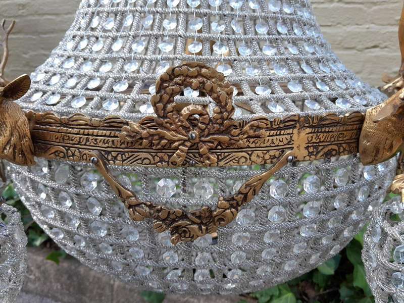 A Large Brass & Aged Pair of Monumental Empire French Style Chandeliers with Deer Head Figures