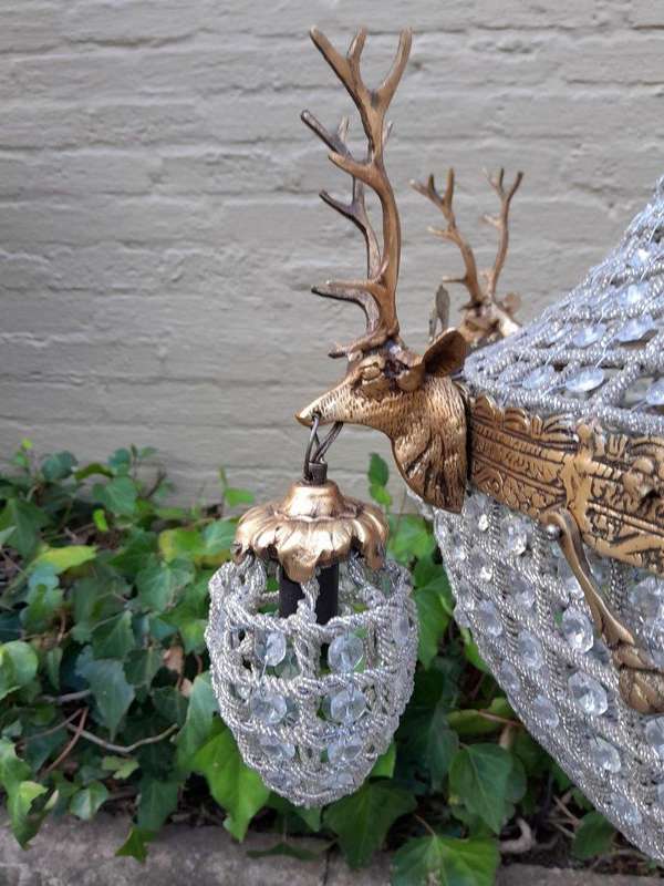 A Large Brass & Aged Pair of Monumental Empire French Style Chandeliers with Deer Head Figures