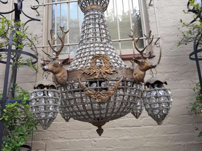 A Brass Gilt & Aged Monumental Empire French Style Chandelier with Deer Head Figures