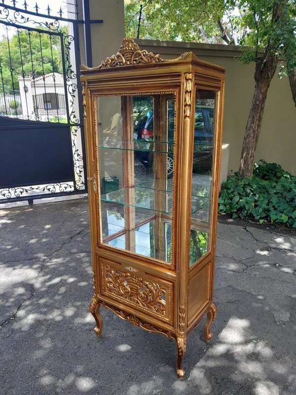 A Pair of French Louis XVI Style Ornately Carved & Gilded Showcases