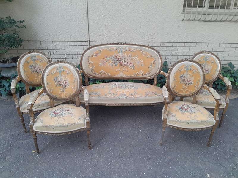 A 19th Century Antique French Giltwood Set Comprising a Settee and Four Medallion Armchairs uphol...