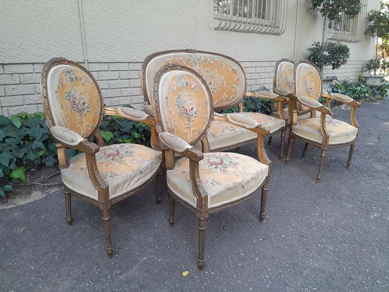 A 19th Century Antique French Giltwood Set Comprising a Settee and Four Medallion Armchairs uphol...