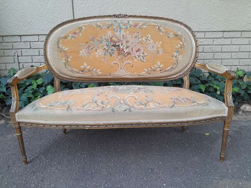 A 19th Century Antique French Giltwood Set Comprising a Settee and Four Medallion Armchairs uphol...