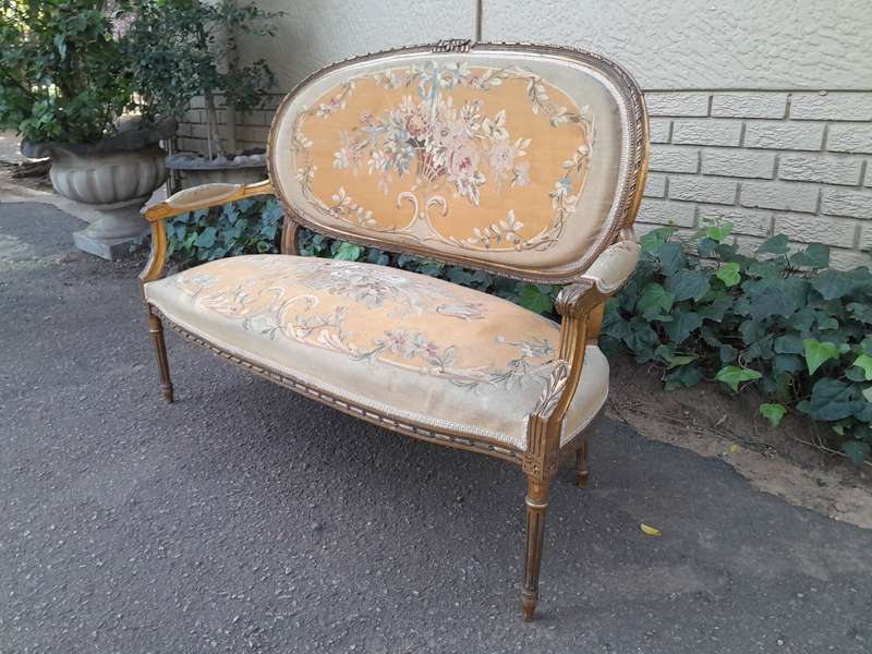 A 19th Century Antique French Giltwood Set Comprising a Settee and Four Medallion Armchairs uphol...