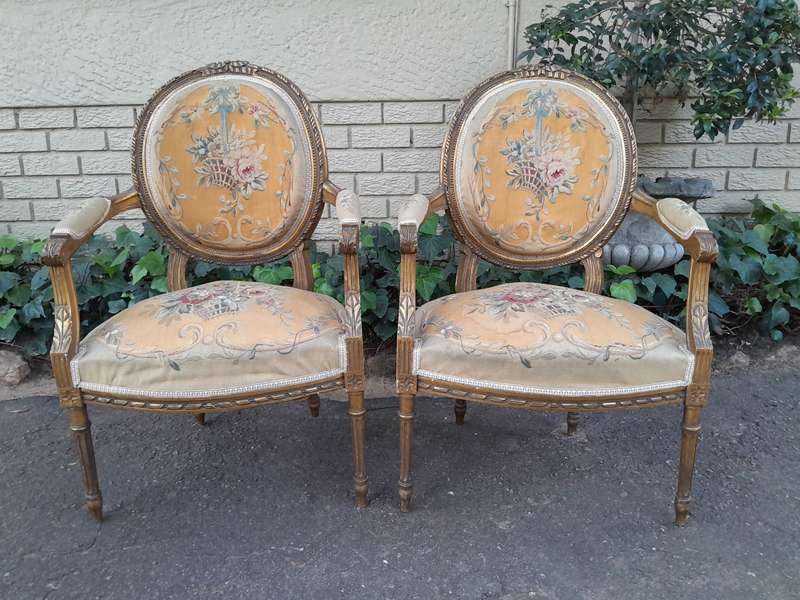 A 19th Century Antique French Giltwood Set Comprising a Settee and Four Medallion Armchairs uphol...