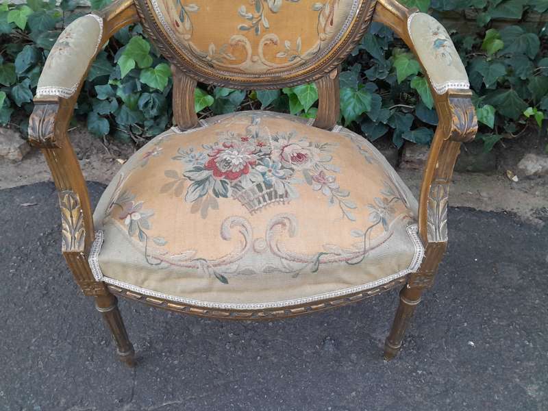 A 19th Century Antique French Giltwood Set Comprising a Settee and Four Medallion Armchairs uphol...
