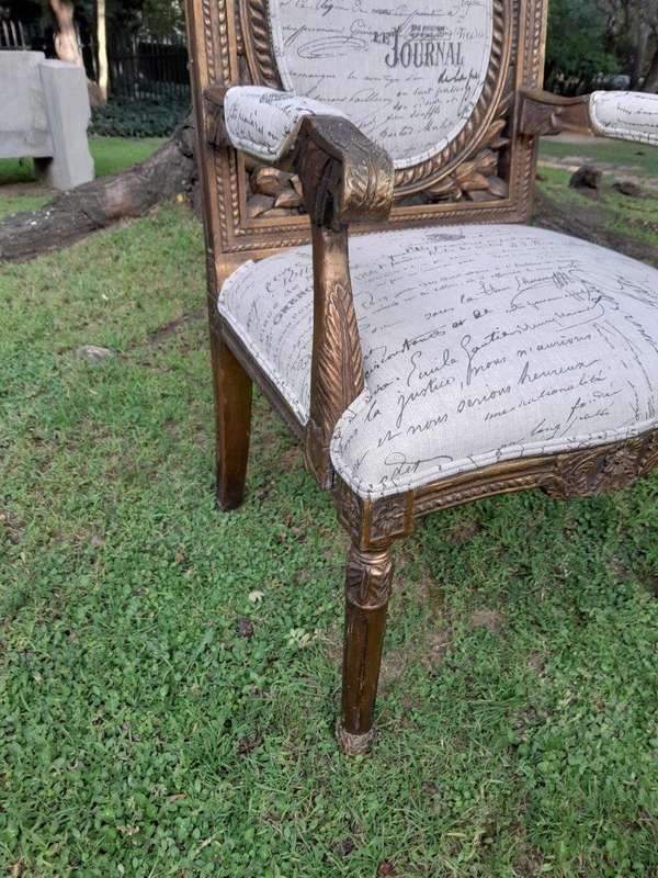 A 20TH Century French Style Pair of Ornately Carved and Gilded Armchairs Upholstered in a Custom-...