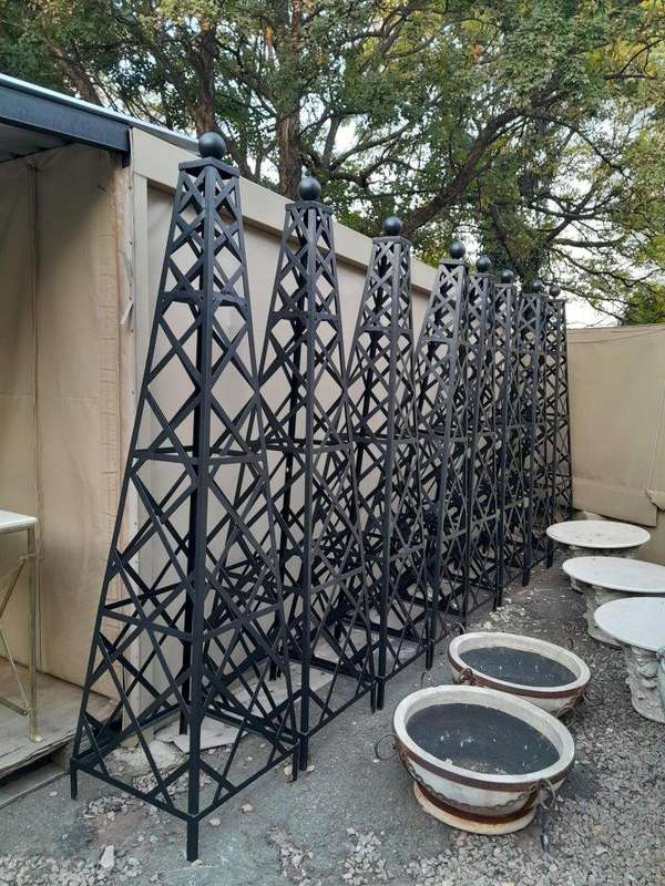 A Handmade Pair Of Wrought Iron Obelisks In A Hand Painted "Aged" Finish