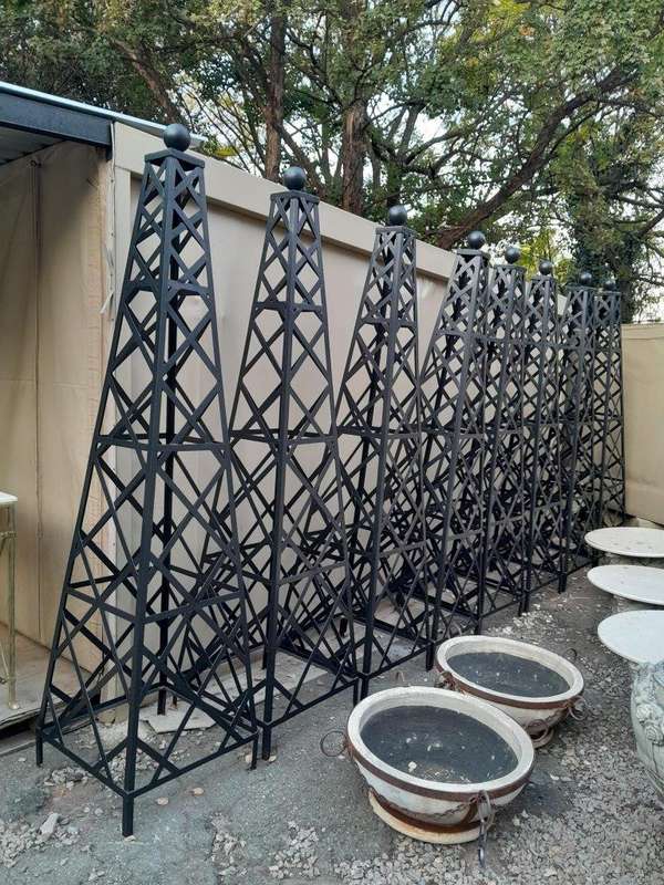 A Handmade Pair Of Wrought Iron Obelisks In A Hand Painted "Aged" Finish