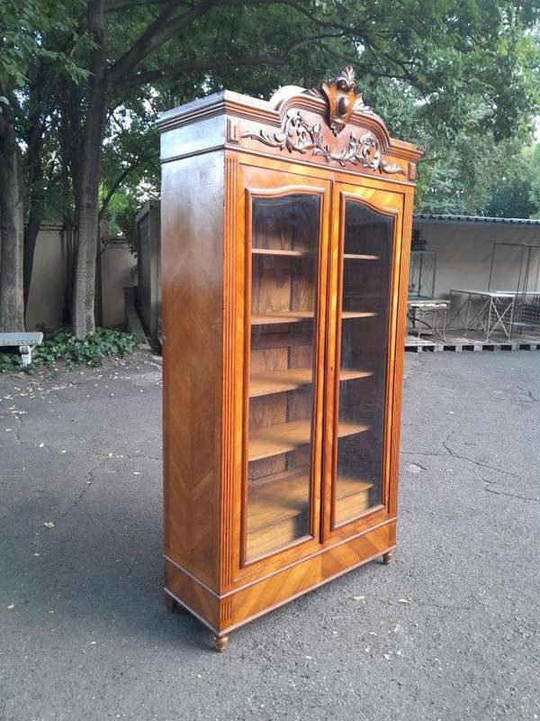 A 19th Century French Rococo Style Bookcase with Bevelled Glass, Shelves and Two Drawers
