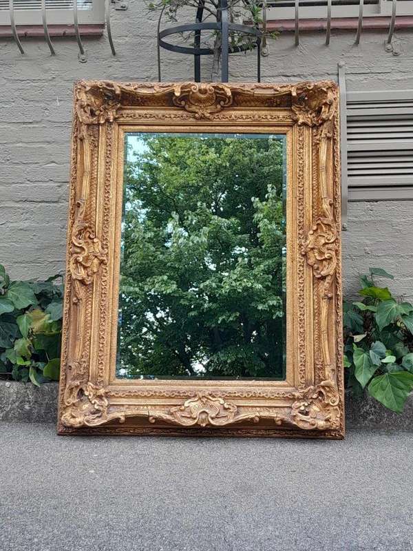 A 20th Century French Style Gilt Framed and Bevelled Mirror