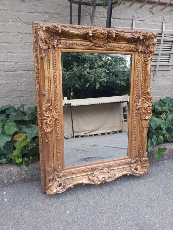A 20th Century French Style Gilt Framed and Bevelled Mirror