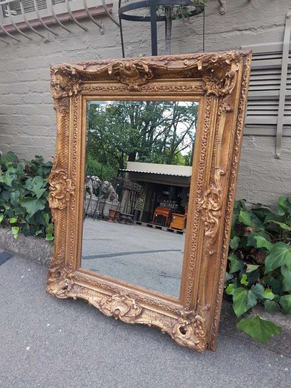 A 20th Century French Style Gilt Framed and Bevelled Mirror