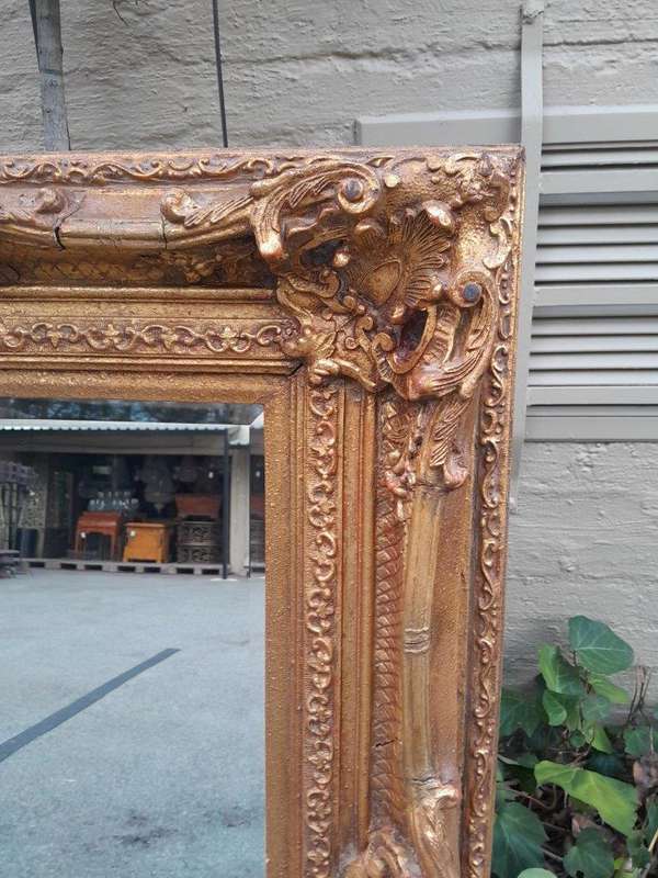 A 20th Century French Style Gilt Framed and Bevelled Mirror